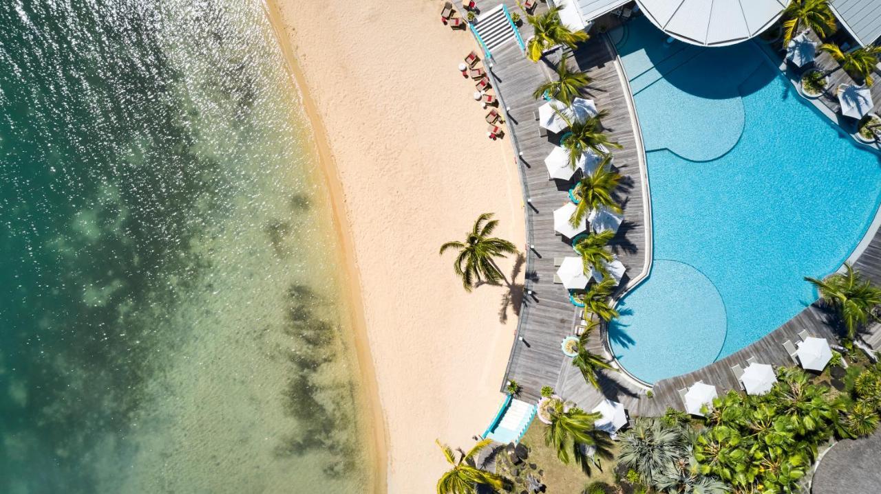 Lux* Grand Gaube Resort & Villas Exteriör bild Aerial view of the pool and beach at the Sheraton Maldives Resort & Spa